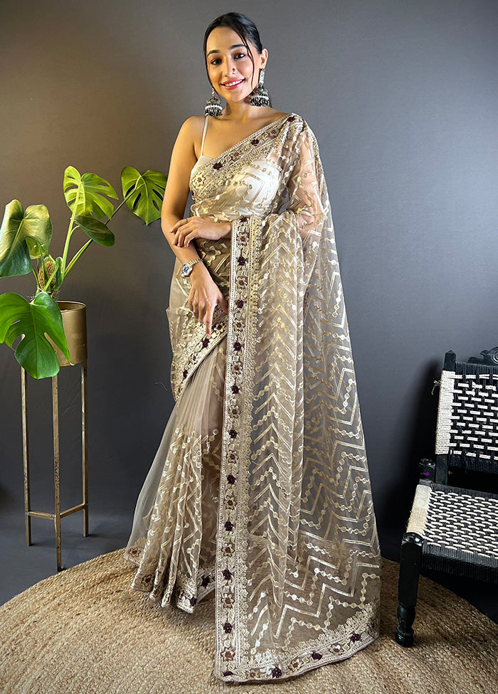 Beige Net Net Saree With Blouse Piece Looking For